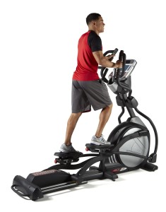 Man Using Sole E95 Elliptical Machine