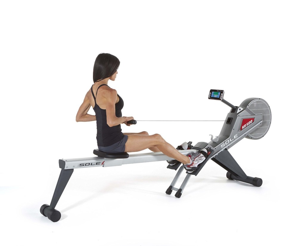 Woman Using Sole SR500 Rower