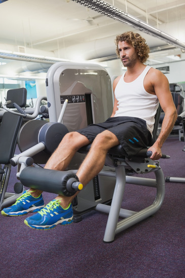 Man Doing A Leg Workout At The Gym