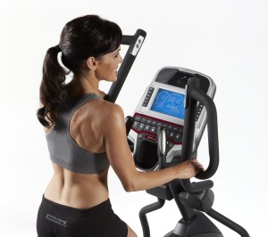 Woman Using E95 Elliptical Trainer