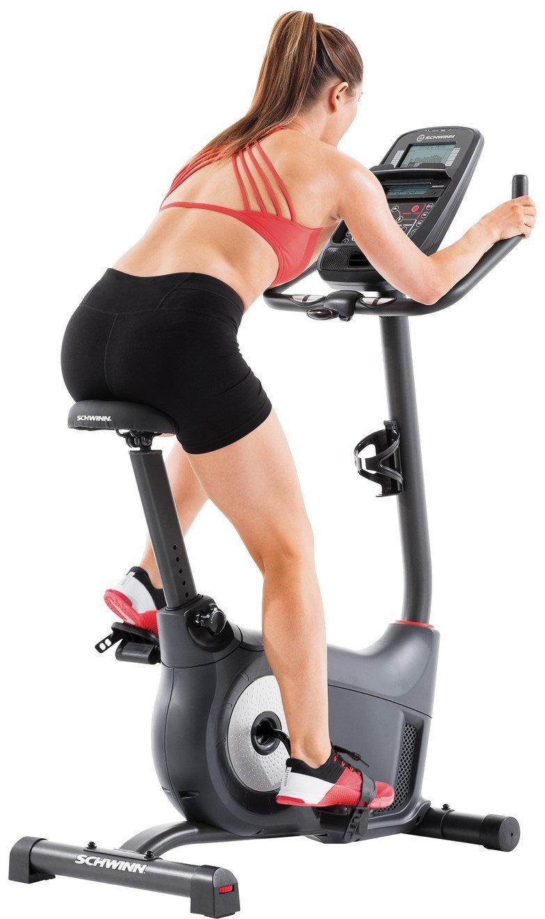 Woman Using Schwinn 130 Exercise Bike