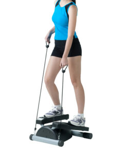 woman using stepper machine