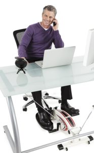Man Using FitDesk Elliptical Under His Desk