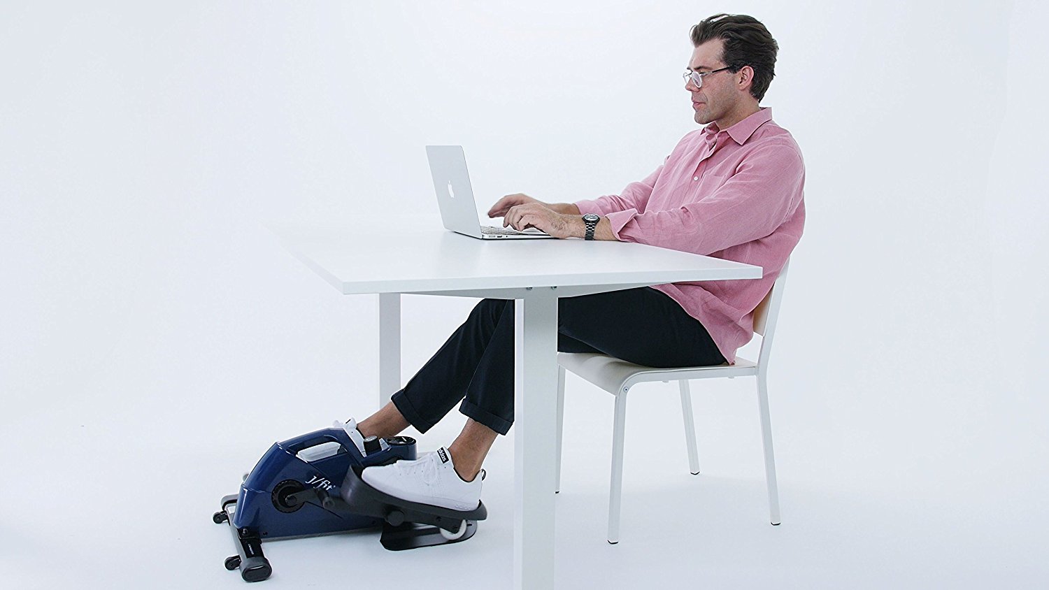Man Using JFit Under Desk Elliptical