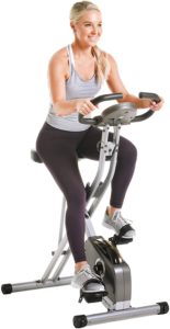 Woman Riding Exerpeutic Magnetic Upright Bike